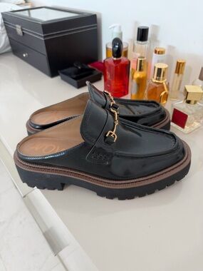 Black Leather Slip-On Loafers with Gold Hardware